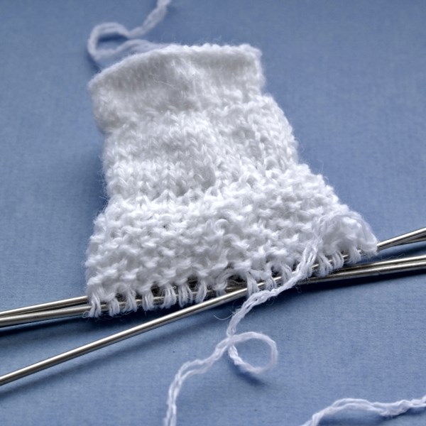 Pagolenok socka med mönstrade sticknålar