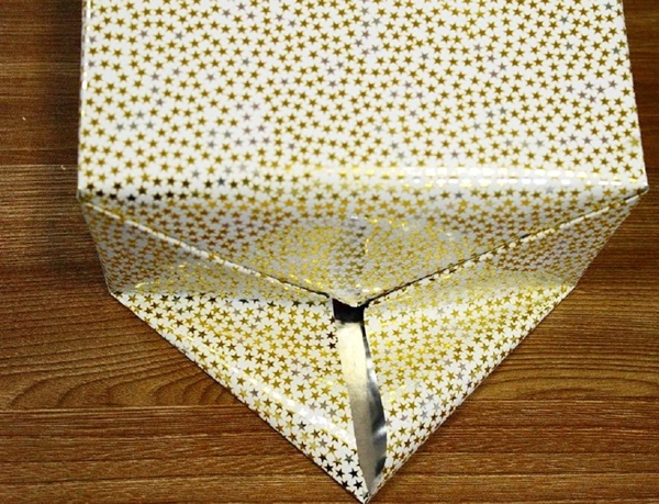 Hur man packar en present i en presentpapper