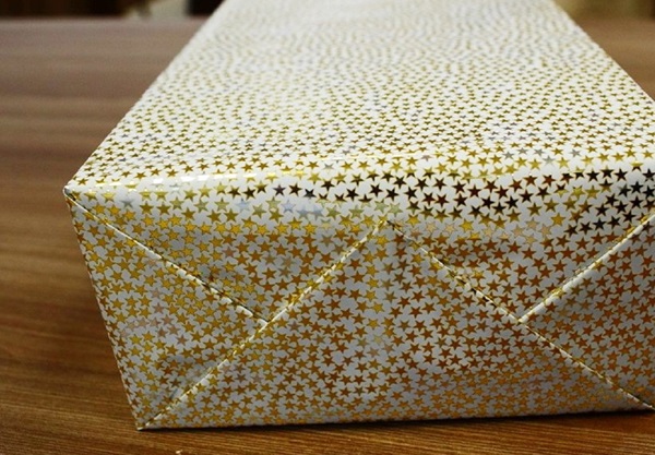 Hur man packar en present i en presentpapper