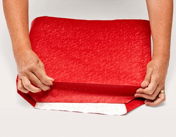 Hur man packar en present i en presentpapper
