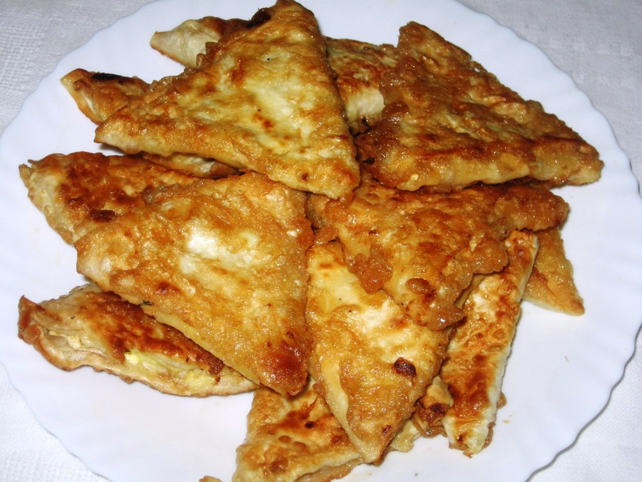 Matlagningshemligheter: recept för de mest utsökta fyllda pannkakorna med foton och videoklipp