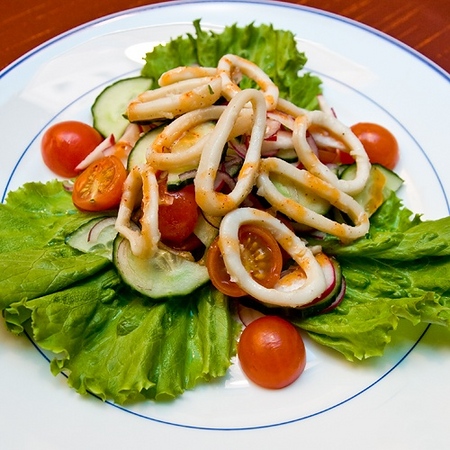 Lenten bord dekoration - bläckfisk sallad